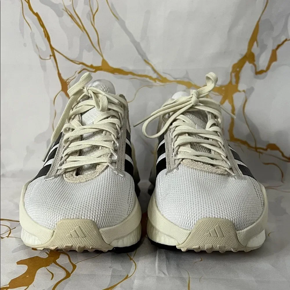 * Adidas Avryn_X sneaker in Cloud White and Core Black